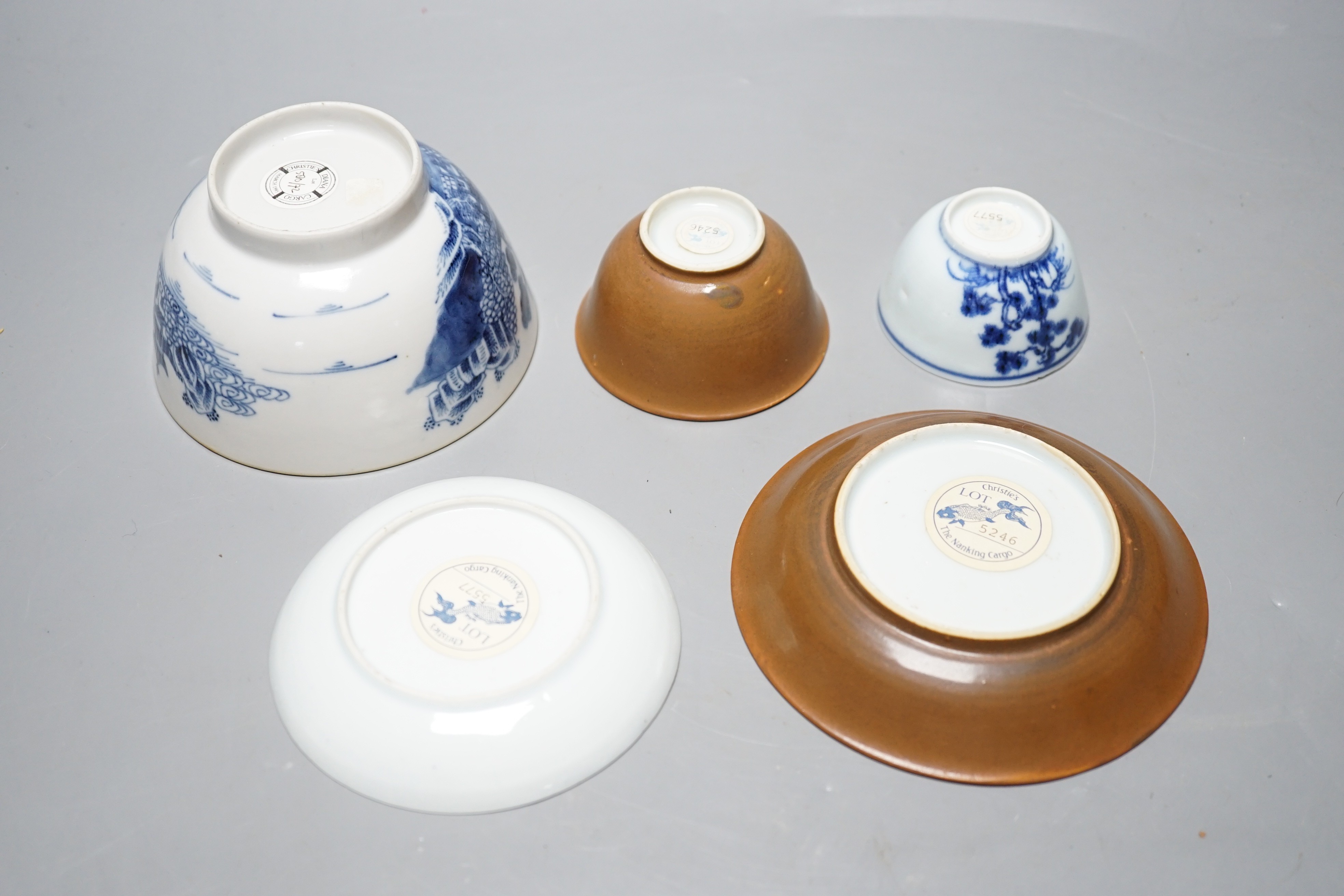 Two Chinese Nanking cargo teabowls and saucers and a Diana cargo sugar bowl, largest 12cm diameter